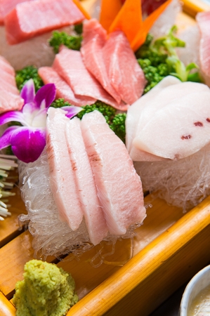 close-up shot of tuna sashimi platter in wood plateの写真素材