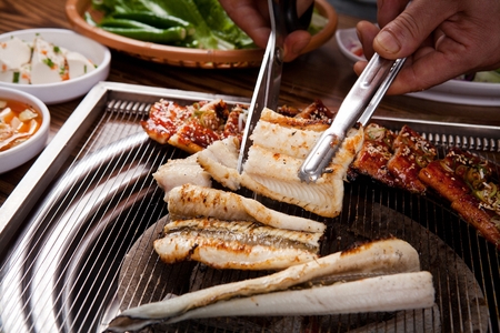 salted and seasoned eels on grillの写真素材
