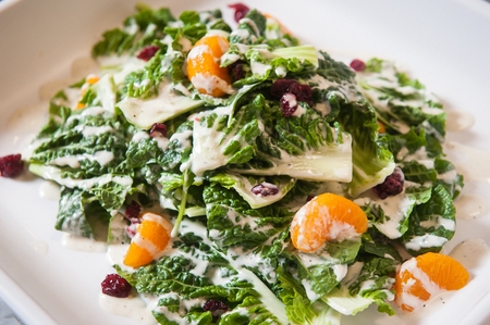 cabbage salad with raisin and mandarinの写真素材