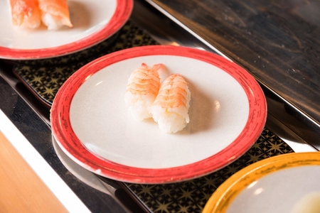 shrimp sushi, sushi bar settingの写真素材