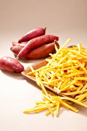 sliced dried sweet potatoes on plateの写真素材