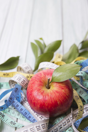 Healthy and weight loss concept, Red  whole and half pieceの写真素材