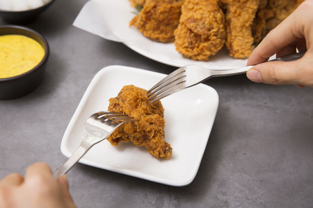 Korean style chicken and beer, delicious fried or spicy sauce chicken with cool beerの写真素材