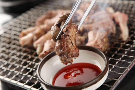 grilled conger, sea eel dipped in sauceの写真素材