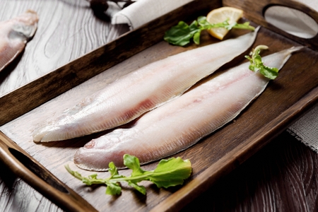 dried fish on wooden plateの写真素材