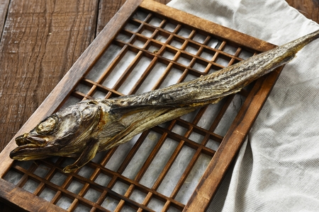 dried fish on window paperの写真素材