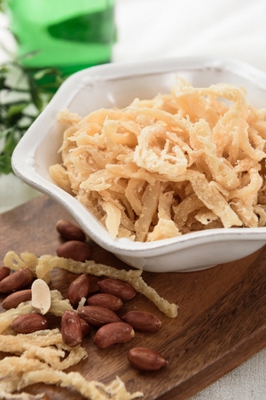 dried squid on small hexagon plate