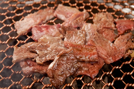 grilled beef on gridironの写真素材