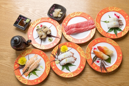 assorted sushi such as shrimp sushi, octopus sushi and pen shell sushi on plateの写真素材