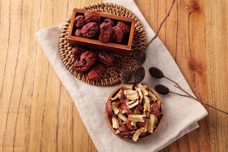 dried jujube on wooden plateの写真素材