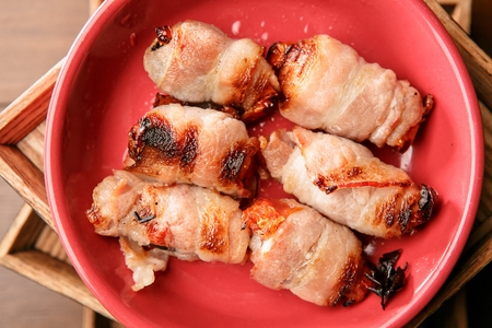 bacon roll with tomatoの写真素材