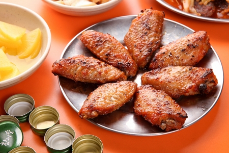 soy marinated grilled chicken wingsの写真素材