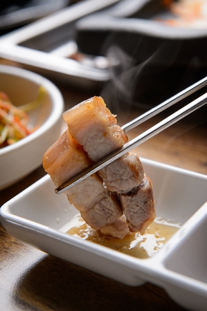 grilled pork dipped in salt sauceの写真素材
