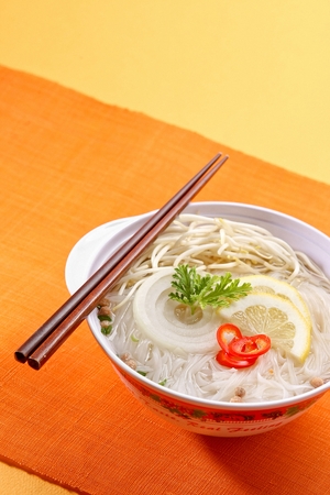 rice noodles soup with various vegetables