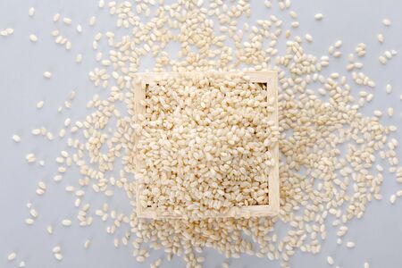 Assortment of Various grains and rice in bowls.の写真素材