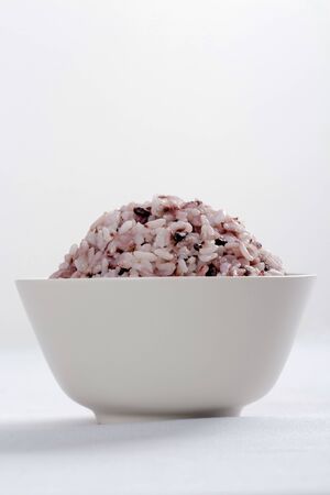 Assortment of Various grains and rice in bowls.の写真素材