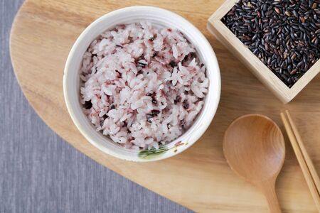 Assortment of Various grains  rice in bowls.の写真素材