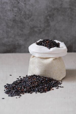 Assortment of Various grains  rice in bowls.の写真素材