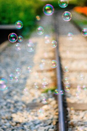railroad and soap bubblesの写真素材