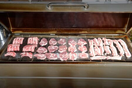 Smoked pork on grill
