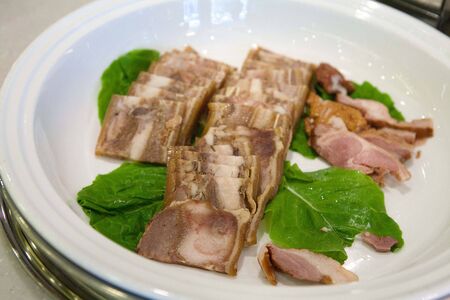Boiled pork slices on plate
