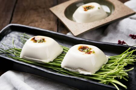 Seasoned and vegetable garnished bean curd tofuの写真素材