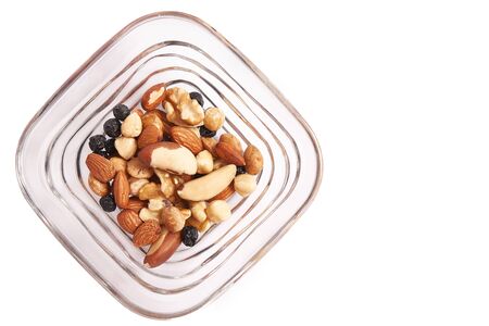 Nuts, almonds, walnuts and peanuts on white backgroundの写真素材