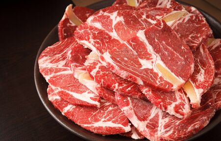 slices of raw sirloinの写真素材