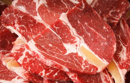 slices of raw sirloinの写真素材