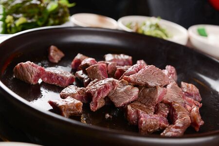 cooked sirloin on round plateの写真素材
