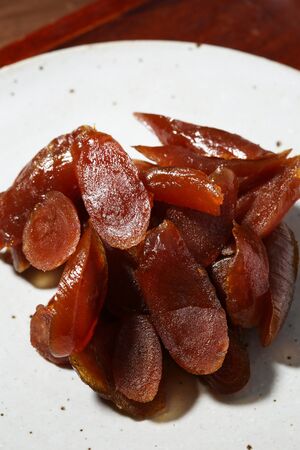 red ginseng slices on plate