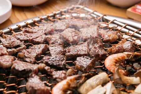 beef and shrimp grilled on pan