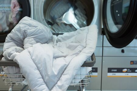 Single life concept, washing machines at laundromatの写真素材