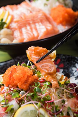 salad with salmon on plateの写真素材