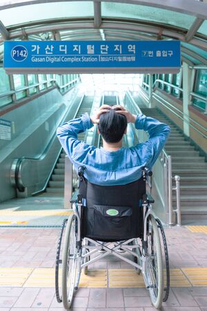 Disabled handicapped man sitting on wheelchair 094の写真素材