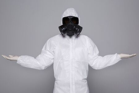 Male scientist in protective suit and antigas mask with glasses. 007の写真素材