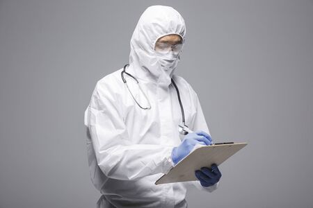 Male scientist in protective suit and antigas mask with glasses. 086の写真素材