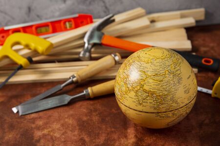 Globe and Hand work tools or construction tools top view