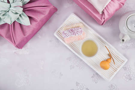 the Korean traditional wrapping cloth, refreshments and greeting card 065の写真素材