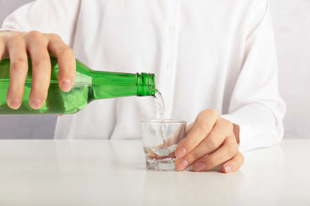 Close up of different glasses and bottles. drinking culture concept photo 112の写真素材