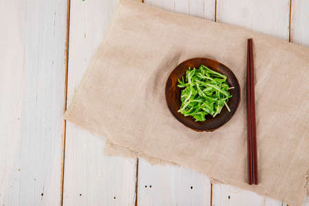Spring vegetables and herbs, close up of nutritious greens sprouting in spring. 099