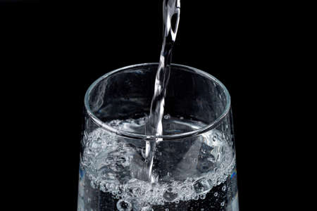 Fresh and clean water concept, water glass isolatedの写真素材
