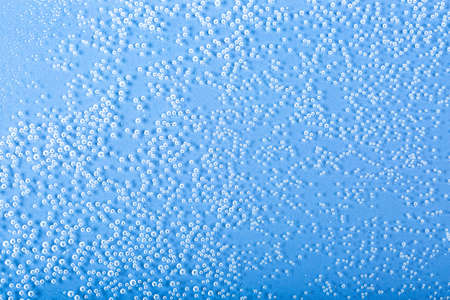 Fresh and clean water concept, water on glass isolated