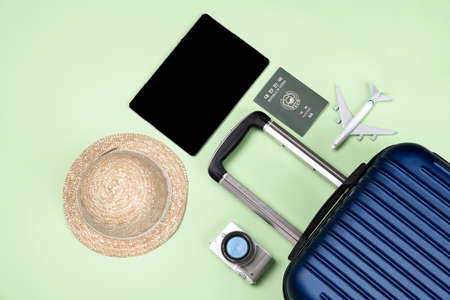 Travel concept- traveler accessories on colorful background