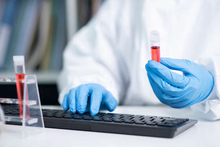 Science, chemistry, biology, and medicine concept, scientist with equipment and science experiments...