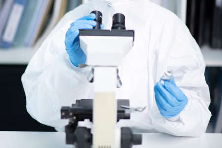 Science, chemistry, biology, and medicine concept, scientist with equipment and science experiments...