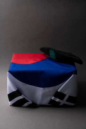 Military symbols concep, South Korean flag and folded military uniform 15の写真素材