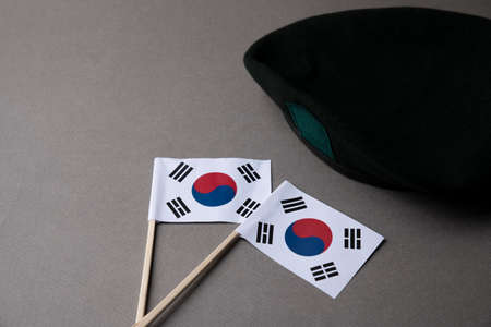 Military symbols concep, South Korean flag and folded military uniform 13の写真素材