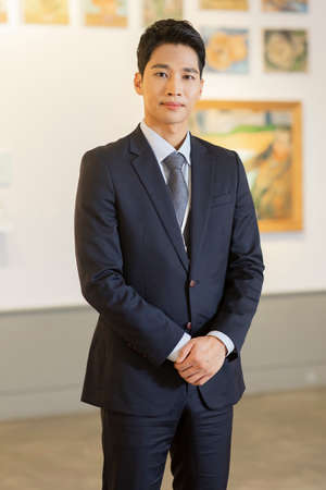 People with guide at exhibition in art gallery 012の写真素材