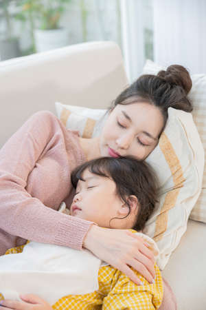 Portrait of happy cheerful family, young mother and two daughters 089